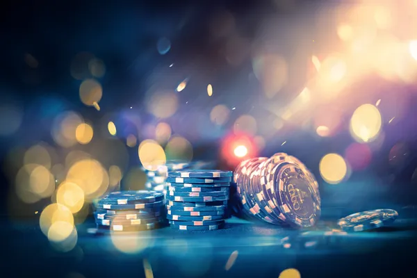 A glamorous woman holding casino chips in a neon-lit environment, representing the premium online casino atmosphere of MARAKUMI.