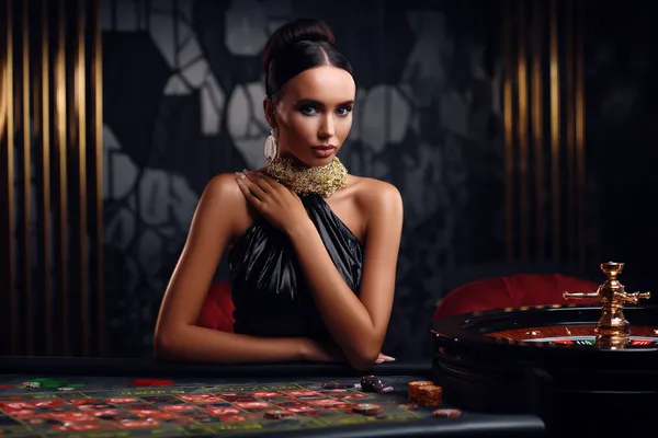 A stylish woman beside vibrant slot machines displaying glowing sevens, showcasing the variety of top slots at MARAKUMI.